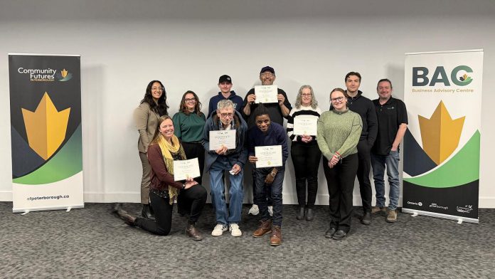 Community Futures Peterborough hosted a Pitch Day on February 18, 2026 for the first cohort of the organization's free NEXT (New Entrepreneurial eXploration Training) program for displaced workers. Back row: Peterborough Downtown Business Improvement Area executive director Nour Mazloum, Peterborough County Economic Development General Manager Rhonda Keenan, Ryan Taylor of Hilltop Land Clearing, Peter Falconeri of Side Hustle Apparel, Lori Alexander of ALT Accounting Services, Peterborough and the Kawarthas Chamber of Commerce Member Engagement Coordinator Liam O'Connor, and Community Futures Peterborough Loan Manager Braden Clark. Front row: Kari Walmsley of Kari's Glass Work, Steve French of The Plant Guy, Yomi Olaoye of MantaHQ, and Community Futures Peterborough Entrepreneurship Officer Allison Adam. (Photo courtesy of Community Futures Peterborough)