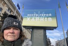 Peterborough native Chloë Black in front of a sign that reads "Hero City Kharkiv" during her sixth trip to Ukraine since Russia launched its full-scale invasion in 2022. Black is currently in Kharkiv volunteering with a local animal shelter and will soon be returning to Kyiv to support the Ukrainian Patriot organization in helping children who have been impacted by the war. (Photo: Chloë Black)