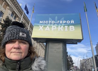 Peterborough native Chloë Black in front of a sign that reads "Hero City Kharkiv" during her sixth trip to Ukraine since Russia launched its full-scale invasion in 2022. Black is currently in Kharkiv volunteering with a local animal shelter and will soon be returning to Kyiv to support the Ukrainian Patriot organization in helping children who have been impacted by the war. (Photo: Chloë Black)