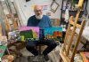 Peterborough artist David Geene explores the ethics and politics of proposed high rises in ‘Economies of Scale?’ exhibit Artist David Geene in his home studio with two 12 by 16 inch paintings of existing buildings that will be featured in his "Economies of Scale?" solo exhibit at Watson & Lou in downtown Peterborough from April 4 to 25, 2026. Titled (left to right) "196 Hunter Street East" and "212 Brock Street from Hunter W. and Aylmer Streets," the works are two of the 12 acrylic paintings that aim to explore the politics and ethics of two proposed high-rise structures in Peterborough, at 90 Hunter Street and on Crescent Street. Including interpretations of the proposed buildings, the exhibit will launch with an opening reception from 2 to 4 p.m. on Saturday, April 4. (Photo courtesy of David Geene)
