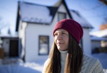 Innovative exterior insulation system can help make older homes more energy efficient Kat Senyk in front of her upgraded home in Port Perry. Through her work experience leading exterior insulation and finish system (EIFS) overcladding projects, she was inspired to retrofit her own home's exterior insulation, contributing to a nearly 50 per cent reduction in energy use. (Photo: Adrian Merrit Smith)