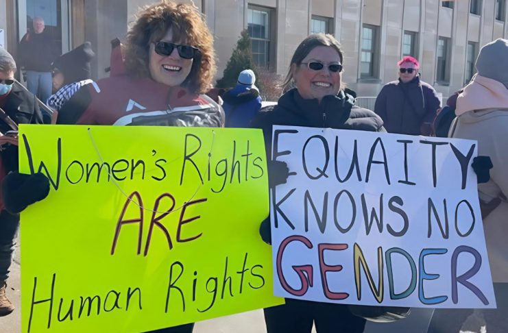 KWIC, KSAC, and YWCA Peterborough Haliburton team up to fight for justice this International Women’s Day Participants of the 2025 International Women's Day rally outside Peterborough City Hall organized by Kawartha Sexual Assault Centre (KSAC) and Kawartha World Issues Centre (KWIC) and supported by the Peterborough Public Library. The YWCA Peterborough Haliburton is also partnering with the organizations for the 2026 event on Saturday, March 7, which includes a rally and march to a community event at the library featuring music, food, a keynote, and conversations. The event aligns with this year's United Nations' International Women's Day 2026 theme of "Rights. Justice. Action. For ALL Women and Girls." (Photo courtesy of KSAC/KWIC)