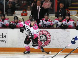 Peterborough Petes left-winger Leon Kolank takes control of the puck during the 17th annual Pink in the Rink game on February 7, 2026, where the Petes defeated the Sudbury Wolves 4-1 before a sold-out crowd at the Peterborough Memorial Centre. (Photo: Kenneth Anderson Photography)
