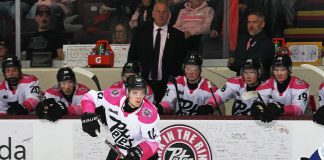 Peterborough Petes left-winger Leon Kolank takes control of the puck during the 17th annual Pink in the Rink game on February 7, 2026, where the Petes defeated the Sudbury Wolves 4-1 before a sold-out crowd at the Peterborough Memorial Centre. (Photo: Kenneth Anderson Photography)