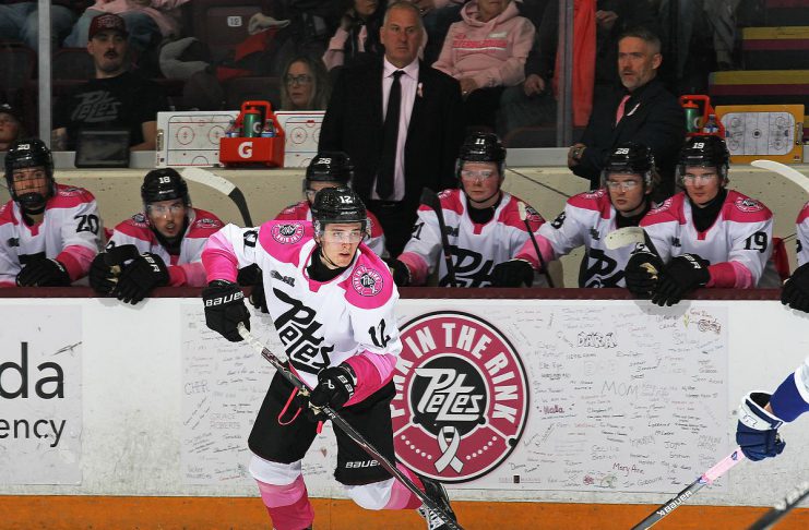 Peterborough Petes left-winger Leon Kolank takes control of the puck during the 17th annual Pink in the Rink game on February 7, 2026, where the Petes defeated the Sudbury Wolves 4-1 before a sold-out crowd at the Peterborough Memorial Centre. (Photo: Kenneth Anderson Photography)