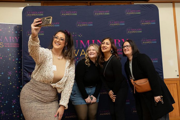 The Tiffany Show's Tiffany Arcari (left), who won the Emerging Entrepreneur award at the inaugural Luminary Awards for Women in Business in 2025, takes a selfie with some of the nominees for the second annual Luminary Awards for Women in Business during a nominee announcement at the Peterborough and the Kawarthas Chamber of Commerce offices on February 11, 2026. (Photo: Jordan Lyall Photography)