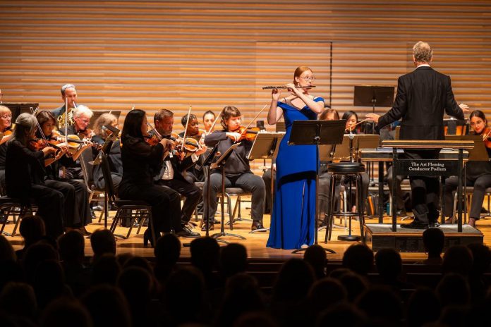 Gillian Derer playing Mozart's "Flute Concerto No. 1 in G Major" with the Niagara Symphony Orchestra in October 2025. The emerging Canadian flutist will be playing the piece as a soloist with the Peterborough Symphony Orchestra during the "Inspired" concert being held on April 12, 2026. The Sunday matinee performance at Showplace Performance Centre will also see the orchestra perform works by Stravinsky, Mozetich, Respighi, and Buhr. (Photo: Dahlia Katz)