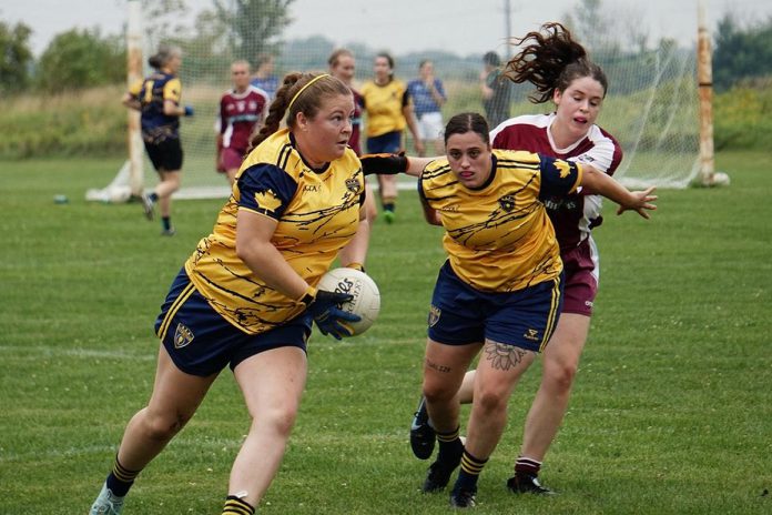 Sarah Batley (with the ball) and Zoe King of the Peterborough Gaelic Athletic Association (GAA), a co-ed Gaelic football club established in 2022. King is one of four female members of the club who have been selected to play for the Canada 1 Team at the 2026 Gaelic Athletic Association (GAA) World Games from July 13 to 17 in Waterford, Ireland. The newly established PTBO Women's Initiative Network (PTBO WIN) is hosting a series of spring fundraisers to cover the costs of sending the four amateur athletes to Ireland. In addition, Batley will be joining the Canada 1 team in Ireland where Peterborough GAA founder Tracy Campbell will be the assistant coach. (Photo courtesy of Peterborough GAA)