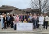 Members of 100 Women Peterborough outside Ashburnham Funeral Home & Reception Centre on April 28, 2026, where they presented a $10,000 cheque to Peterborough Child and Family Centres, representing the collective donations of the members of the group. (Photo: Jeannine Taylor / kawarthaNOW)