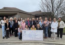Members of 100 Women Peterborough outside Ashburnham Funeral Home & Reception Centre on April 28, 2026, where they presented a $10,000 cheque to Peterborough Child and Family Centres, representing the collective donations of the members of the group. (Photo: Jeannine Taylor / kawarthaNOW)