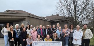 Members of 100 Women Peterborough outside Ashburnham Funeral Home & Reception Centre on April 28, 2026, where they presented a $10,000 cheque to Peterborough Child and Family Centres, representing the collective donations of the members of the group. (Photo: Jeannine Taylor / kawarthaNOW)