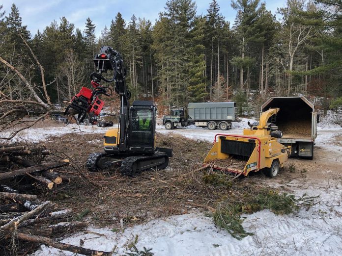 In partnership with the Ontario Woodlot Association, Woodleigh Farms in Peterborough County has launched a forest biomass recovery service to convert unmarketable forest biomass into compost and organic soil amendments including carbon-sequestering biochar. Owner Norm Lamothe says increasing organic matter make soils more resilient, can increase soil's water-holding capacity by 10 per cent, and reduces the need for costly commercial fertilizer. (Photo courtesy of Woodleigh Farms)