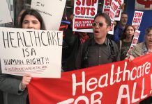 A protest in Toronto on April 14, 2026 against changes to the Interim Federal Health Program (IFHP) that would require refugees to begin paying fees for some healthcare services starting May 1. (kawarthaNOW screenshot of CBC video)