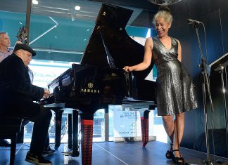 Molly Johnson headlines International Jazz Day Peterborough with April 26 Market Hall concert Juno award-winning Canadian jazz vocalist Molly Johnson performing with pianist Robi Botos and bassist Mike Downes at the 2019 Kensington Market Jazz Festival in 2019. Johnson will be performing with Botos and Downes along with drummer David Direnzo at Market Hall Performing Arts Centre in downtown Peterborough on April 26, 2026 as part of the annual International Jazz Day Peterborough celebrations. (Photo via Tom's Place website)