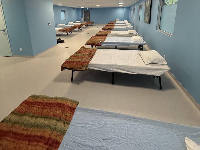 A new 12-bed emergency shelter in Lindsay opened at April 13, 2026 at the Community Integrated Care Hub ("The Hub"), a purpose-built space at 22 Peel Street designed to provide services for people experiencing homelessness and concurrent conditions including addictions. Led by the John Howard Society of the Kawarthas, The Hub is funded through the Ontario government's Homelessness Prevention Program and Building Faster Fund, with financial contributions from City of Kawartha Lakes, the United Way Kawartha Lakes and Haliburton, and the Kawartha Community Foundation. (Photo: John Howard Society of the Kawarthas)