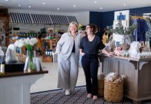Alicia Doris and Sam Turner stand in the new Living Local Marketplace storefront, which has permanently relocated to Horlings Garden Centre in Selwyn. Doris, who founded Living Local Marketplace with the mission to support local and regional artisans and small businesses, says the move is the response to positive community feedback following the store's temporary pop-up at Horlings during the holidays. Horlings co-owner Turner says the move also benefits the garden centre by bringing in more customers for its services. (Photo: Kayla LeFranc)