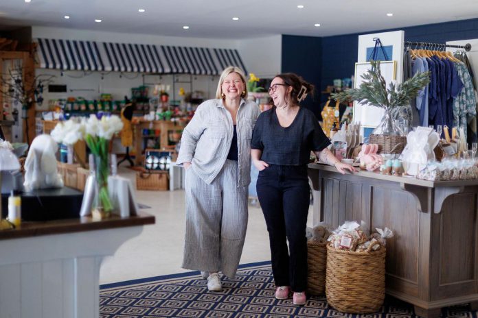Alicia Doris and Sam Turner stand in the new Living Local Marketplace storefront, which has permanently relocated to Horlings Garden Centre in Selwyn. Doris, who founded Living Local Marketplace with the mission to support local and regional artisans and small businesses, says the move is the response to positive community feedback following the store's temporary pop-up at Horlings during the holidays. Horlings co-owner Turner says the move also benefits the garden centre by bringing in more customers for its services. (Photo: Kayla LeFranc)