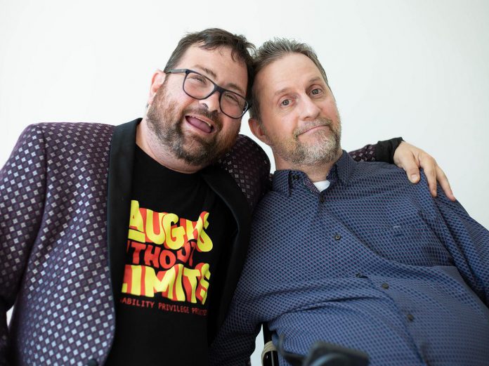 Jared Nathan and Blair "TheHandy" Williams, both Toronto comedians living with disability, are the founders of Disability Privilege Productions, which aims to make comedy more accessible and inclusive. The company is bringing its "Laughs Without Limits" stand-up comedy show to The Theatre on King in downtown Peterborough on April 25, 2026. Hosted by Blair and headlined by Jared, the show will also feature comedians Tia Percy and Todd Blenkhorn. (Photo courtesy of Disability Privilege Productions)