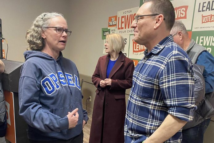 Marcia Steeves, OPSEU Local 351 president representing support staff at Fleming College and president of the Peterborough and District Labour Council, speaks with Avi Lewis in Peterborough on March 6, 2026, prior to Lewis being elected as the leader of the federal NDP. Steeves has been nominated as a Community Catalyst, one of the two new Luminary Awards in 2026, and says the nomination recognizes that being a labour activist is important work. (Photo courtesy of Marcia Steeves)