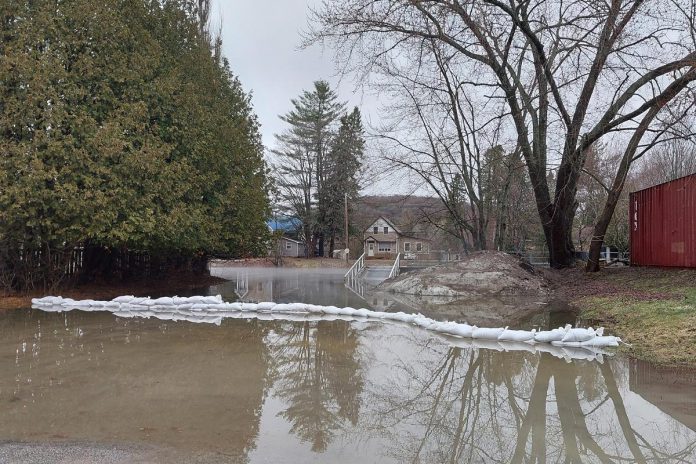 Self-serve sand and sandbags are available at the Minden Curling Club parking lot at 50 Parkside St. in Minden and at the Irondale Community Centre at 1004 Line Drive Road in Irondale. Residents are asked to bring their own shovels, and to help out their neighbours if they are unable to obtain sandbags themselves. (Photo: Haliburton County OPP / Facebook)