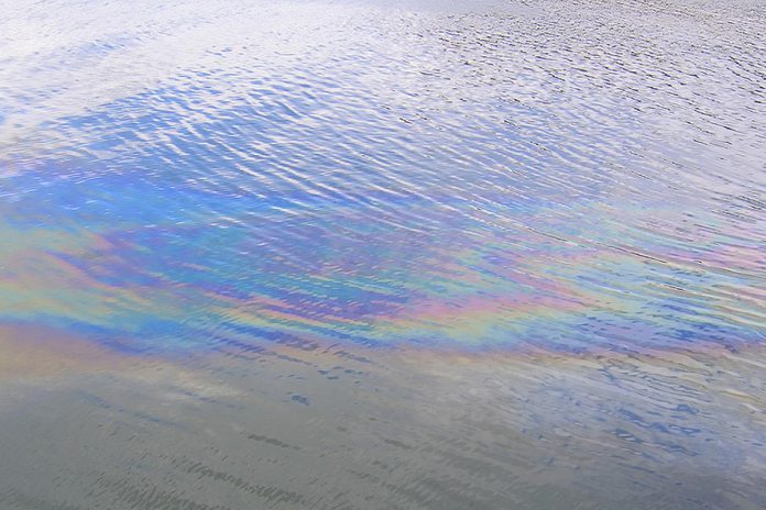 An oil slick on water. (Stock photo)