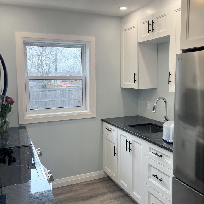 The kitchen of One City Peterborough's newest backyard additional rental unit (ARU), constructed as part of a partnership with Peterborough Action for Tiny Homes. The kitchen countertops were donated by Gus's Kitchen and Bath. (Photo: Michael Vanderherberg / One City Peterborough)