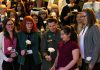 Peterborough Community Health Centre executive director Ashley Safar, former YWCA Peterborough Haliburton executive director Lynn Zimmer, Senator Marilou McPhedran, Maryam Monsef's niece Ellia, and Kawartha Financial Services senior manager of commercial solutions Darlene Weales hold white roses in memory of the late Peterborough civic leader Ann Farquharson during the "A Conversation About The Status of Women In Our Community" event at Market Hall in downtown Peterborough on March 31, 2026, presented by Maryam Monsef's organization ONWARD in partnership with the Peterborough and Kawarthas Chamber of Commerce, which featured 16 female speakers engaging in conversation on important issues related to women's health, resilience, and leadership. (Photo: Jordan Lyall / kawarthaNOW)