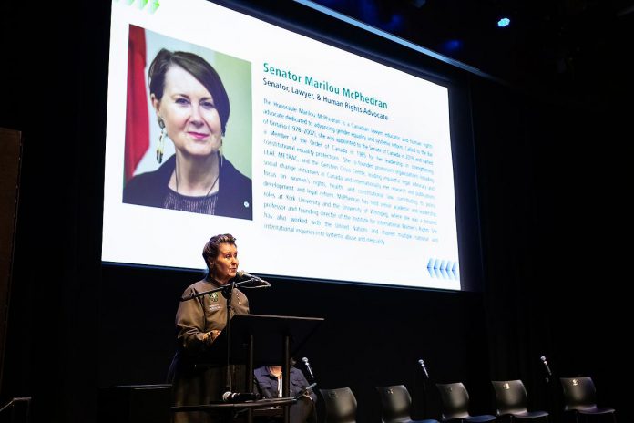 Senator Marilou McPhedran, member of the Senate of Canada and a lawyer and human rights advocate, speaks at the "A Conversation About The Status of Women In Our Community" event at Market Hall in downtown Peterborough on March 31, 2026, presented by Maryam Monsef's organization ONWARD in partnership with the Peterborough and Kawarthas Chamber of Commerce. (Photo: Jordan Lyall / kawarthaNOW)
