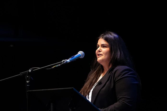 Kylie Fox-Peltier, principal consultant and co-founder of Indigenize, speaks at the "A Conversation About The Status of Women In Our Community" event at Market Hall in downtown Peterborough on March 31, 2026, presented by Maryam Monsef's organization ONWARD in partnership with the Peterborough and Kawarthas Chamber of Commerce. (Photo: Jordan Lyall / kawarthaNOW)