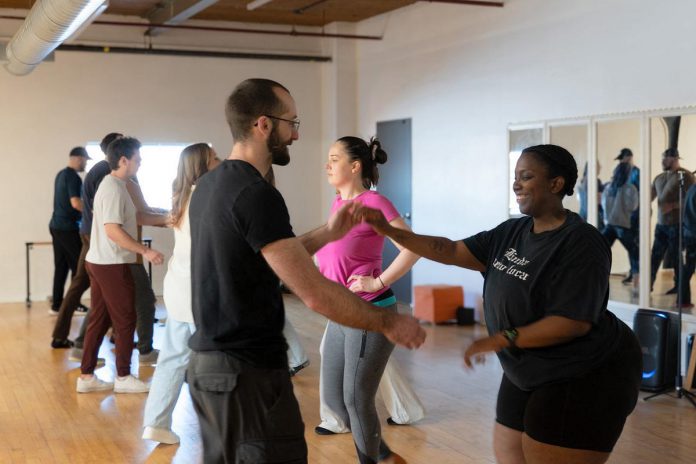The new Peterborough dance studio PTBO Ballroom is not only teaching participants how to enjoy the benefits of ballroom and Latin dance but is also building a community around it. Founded by Courtney Carter, the studio leads private wedding dance lessons, as well as drop-in, series, and pop-up classes and events in a range of styles including salsa, bachata, merengue, swing, hustle, and more. (Photo courtesy of Courtney Carter) The new Peterborough dance studio PTBO Ballroom is not only teaching participants how to enjoy the benefits of ballroom and Latin dance but is also building a community around it. Founded by Courtney Carter, the studio leads private wedding dance lessons, as well as drop-in, series, and pop-up classes and events in a range of styles including salsa, bachata, merengue, swing, hustle, and more. (Photo courtesy of Courtney Carter)