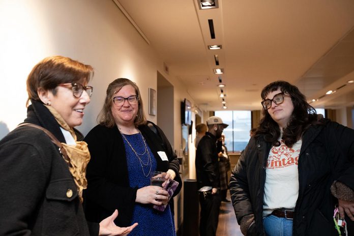 Ashley Bonner (second from left), a potential for the City of Peterborough's Ashburnham Ward, with Tracy Germa (left) and Helen McCarthy in the lobby at Market Hall Performing Arts Centre in downtown Peterborough during the "So, You Want to Run for Council - Candidate 101 Information Session" on March 31, 2026. (Photo: Jordan Lyall / kawarthaNOW)