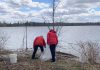 Two of the 35-plus volunteers who participated in an Earth Day clean-up of Rogers Cove park in Peterborough on April 19, 2026, picking up litter along the Little Lake waterfront and in the park. The clean-up was organized by Becca Durbin, owner of Salix Environmental Consulting, in partnership with Clean Up Peterborough and the City of Peterborough. (Photo: Bethan Bates / kawarthaNOW)