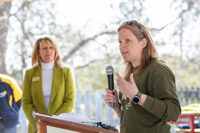Mary Kate Whibbs, operations and support manager at Riverview Park and Zoo, speaks as Rotary Accessible Playground steering committee chair Betty Halman-Plumley looks on during an event at the zoo on April 22, 2026. (Photo: Jordan Lyall / kawarthaNOW)