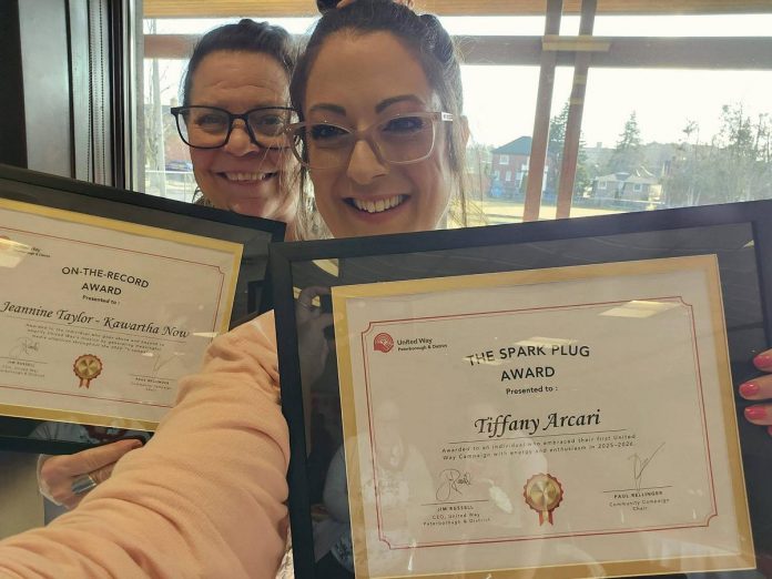 Jeannine Taylor and Tiffany Arcari display the awards they received from the United Way Peterborough & District during a campaign celebration at the McDonnell Street Activity Centre on April 9, 2026. Other awards were presented to the City of Peterborough, Peterborough County, New Canadians Centre, John Howard Society of the Kawarthas, Trent University, Trent Valley Learning Association, and the Peterborough, Victoria, Northumberland and Clarington Catholic School Board. (Photo: Tiffany Arcari)