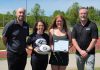Peterborough athlete Clare Hutchinson named 2026 recipient of Steve Montador Bursary Claire Hutchinson (second from right) is the 2026 recipient of the Helping Others Participate Equally (HOPE) Bursary in honour of the late Steve Montador, who suffered concussions playing hockey that ultimately ended his career. Also pictured from left to right are Greater Peterborough Health Services Foundation (GPHSF) executive director Vince Bierworth, Hutchinson's teacher and coach Kristine McCracken, and HOPE board member Mike Keating. (Photo courtesy of GPHSF)