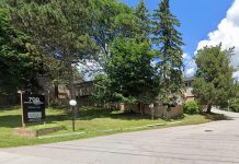 Simple Investor Real Estate Group (SIREG) Management Inc. owns the property at 700 Parkhill Road West, which consists of 10 two-storey residential townhomes with 128 three-bedroom rental units. SIREG wants to convert the rental units to condominiums. (Photo: Google Maps)