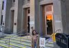Peterborough resident Brooke Roberts holding a photo of her late daughter Sofie while standing outside Peterborough City Hall on May 2, 2026, when it was lit up in grey, yellow, and teal in honour of Brain Cancer Awareness Month. Brooke is an ambassador for Brain Cancer Canada, a national charity that works to raise awareness and bridge the gap in funding for brain cancer research and access. (Photo courtesy of the Roberts family)
