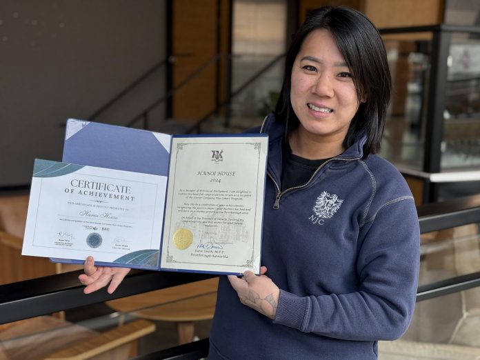 Susan Tung holds the certificate she was awarded after graduating from the Starter Company Plus program delivered by the Business Advisory Centre at Community Futures Peterborough (CFP). She says the program not only helped her learn valuable insights to expand her business and helped her connect with like-minded entrepreneurs, but it connected her with knowledgeable staff at Community Futures Peterborough with whom she continued to work when opening her latest restaurant, Mei Mei. (Photo courtesy of Community Futures Peterborough)