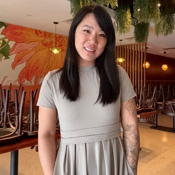 Susan Tung stands in Mei Mei, the Chinese restaurant she opened in Peterborough. After growing up working in her parents' restaurant in Cavan, she launched her first restaurant Hanoi House in 2020. Since then, she has expanded Hanoi House by launching Electric City Catering with the help of a micro-grant from the Business Advisory Centre's Starter Company Program at Community Futures Peterborough (CFP) and obtained a flexible loan from CFP to finance renovations to open Mei Mei. (Photo courtesy of Susan Tung)