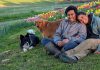 Garreth Dias and Jesvyl Dsilva with their dogs Lexie and Leo near the tulip patch on their 50-acre farm near Rice Lake south of Bailieboro. In 2021, the couple sold their Oakville condo and moved to northern Northumberland County despite not having any farming experience. Since then, Dias and Dsilva have been raising chickens and growing food on Eyra Estate and has seen a huge demand for their tulip agri-tourism experience where they invite people learn about farm life. (Photo courtesy of Garreth Dias and Jesvyl Dsilva)