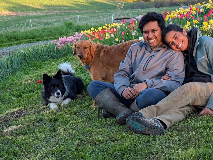Garreth Dias and Jesvyl Dsilva with their dogs Lexie and Leo near the tulip patch on their 50-acre farm near Rice Lake south of Bailieboro. In 2021, the couple sold their Oakville condo and moved to northern Northumberland County despite not having any farming experience. Since then, Dias and Dsilva have been raising chickens and growing food on Eyra Estate and has seen a huge demand for their tulip agri-tourism experience where they invite people learn about farm life. (Photo courtesy of Garreth Dias and Jesvyl Dsilva) Garreth Dias and Jesvyl Dsilva with their dogs Lexie and Leo near the tulip patch on their 50-acre farm near Rice Lake south of Bailieboro. In 2021, the couple sold their Oakville condo and moved to northern Northumberland County despite not having any farming experience. Since then, Dias and Dsilva have been raising chickens and growing food on Eyra Estate and has seen a huge demand for their tulip agri-tourism experience where they invite people learn about farm life. (Photo courtesy of Garreth Dias and Jesvyl Dsilva)