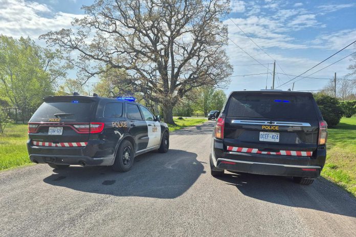 OPP vehicles at the scene of a motorcycle crash on Boundary Road east of Brighton that claimed the life of a 38-year-old Brighton man on May 19, 2026. (Police-supplied photo)