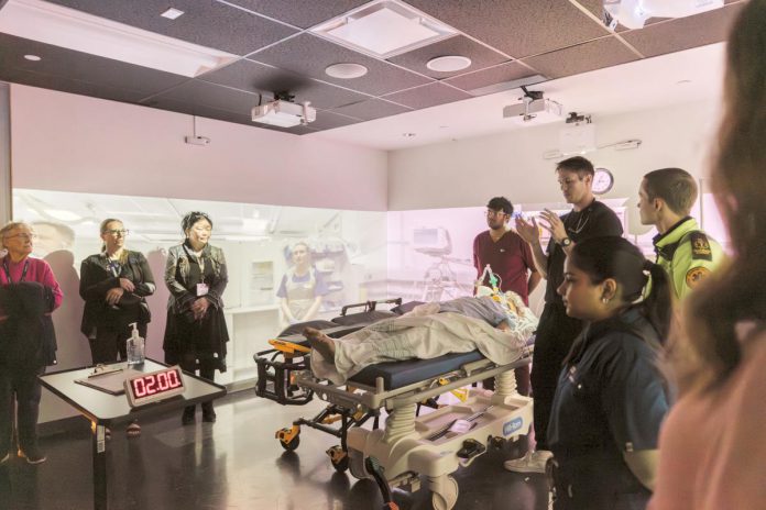 During Fleming College's Community Impact & Appreciation Event at the Sutherland Campus in Peterborough on April 30, 2026, attendees participated in a tour of the School of Health and Community Services, where guests experienced how expanded healthcare programs, flexible delivery, and simulation-based learning is playing a key role in producing the in-demand healthcare talent needed in our community, region, and province. (Photo: Mary Zita Payne for Fleming College)