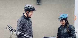 While Dr. Joe Hoja (left) has spent decades cycling through Peterborough, commuting by bike is a newer experience for Dr. Bella Sudik (right). Now sharing a similar ride to work, the two have bonded over their love of cycling and rarely miss a chance to swap biking tips. (Photo: Rebekkah Hyams / GreenUP