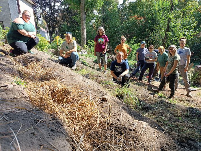 GreenUP volunteers pose for a photo to showcase the end product of a landscape contouring workshop in fall 2025 as part of GreenUP's Restoration Wednesdays Volunteer Stewardship event series. After creating swales and berms, it's beneficial to mulch the berms to protect the exposed soil from the sun and wind. Woodchips, straw, dried leaves, or any other seedless light organic matter will do the trick. (Photo: Christina Balint / GreenUP) GreenUP volunteers pose for a photo to showcase the end product of a landscape contouring workshop in fall 2025 as part of GreenUP's Restoration Wednesdays Volunteer Stewardship event series. After creating swales and berms, it's beneficial to mulch the berms to protect the exposed soil from the sun and wind. Woodchips, straw, dried leaves, or any other seedless light organic matter will do the trick. (Photo: Christina Balint / GreenUP)