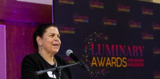kawarthaNOW founder, CEO, and publisher Jeannine Taylor accepting the Peterborough and Kawarthas Chamber of Commerce's inaugural Legacy award of the Luminary Awards for women in business in 2025, one year before the 30th anniversary of the digital media company she founded on May 1, 1996 in the early years of the internet. (Photo: Jordan Lyall Photography)