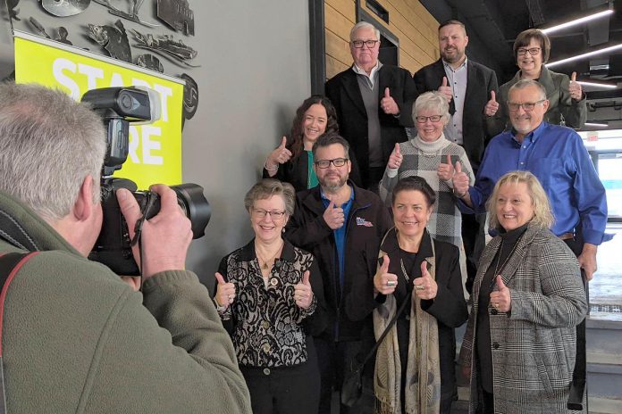 Jeannine Taylor (front row, middle) with her fellow inductees to the Peterborough Business Hall of Fame in 2024. (Photo: Bruce Head)