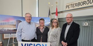 Peterborough mayor Jeff Leal, Peterborough and Kawarthas Chamber of Commerce president and CEO Brenda Whitehead, Peterborough Downtown Business Improvement Area (DBIA) board chair Deanna Guttman, and Paul Harris-Lowe of the city's economic development working group during a media conference at the Chamber's office on May 4, 2026 where the mayor advocated for a new event centre in downtown Peterborough. (Photo: Jeannine Taylor / kawarthaNOW)