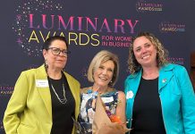 Dr. Jenny Ingram (middle) receiving the Legacy award, which honours a woman "whose career is defined by excellence, generosity, and community impact," at the Peterborough and Kawarthas Chamber of Commerce's second annual Luminary Awards celebration at Trent University's Champlain College on May 7, 2026. One of seven women who received awards, Dr. Ingram is a trailblazer in geriatric medicine and seniors' care and the founder of the Kawartha Centre, the site for international Alzheimer research trials, and recently released the documentary "No More Silent Battles." Also pictured are the inaugural Legacy award winner Jeannine Taylor of kawarthaNOW (left) and Julie Kellett of sponsor Darling Insurance. (Photo courtesy of Jeannine Taylor / kawarthaNOW)