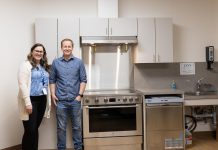 Peterborough Community Health Centre executive director Ashley Safar with Craig Mortlock, co-owner of MCI Constructors Inc., which donated $30,000 to the centre to fund the full outfitting of a new community kitchen and the purchase and installation of a washer and dryer. The new additions will allow the centre to address immediate needs of its clients from marginalized communities as well as improve the centre's ability to provide wraparound community-based care. (Photo courtesy of Peterborough Community Health Centre)